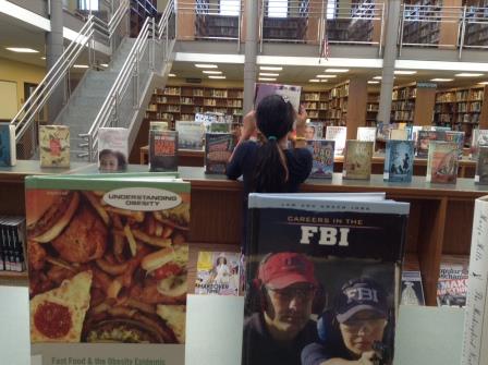 Student reading at the Middle School Library